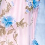 Dirndl Rosa Vergrößerung der blumenbestickten Schürze